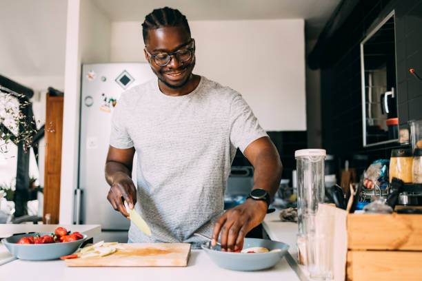 man cooking in kitchen